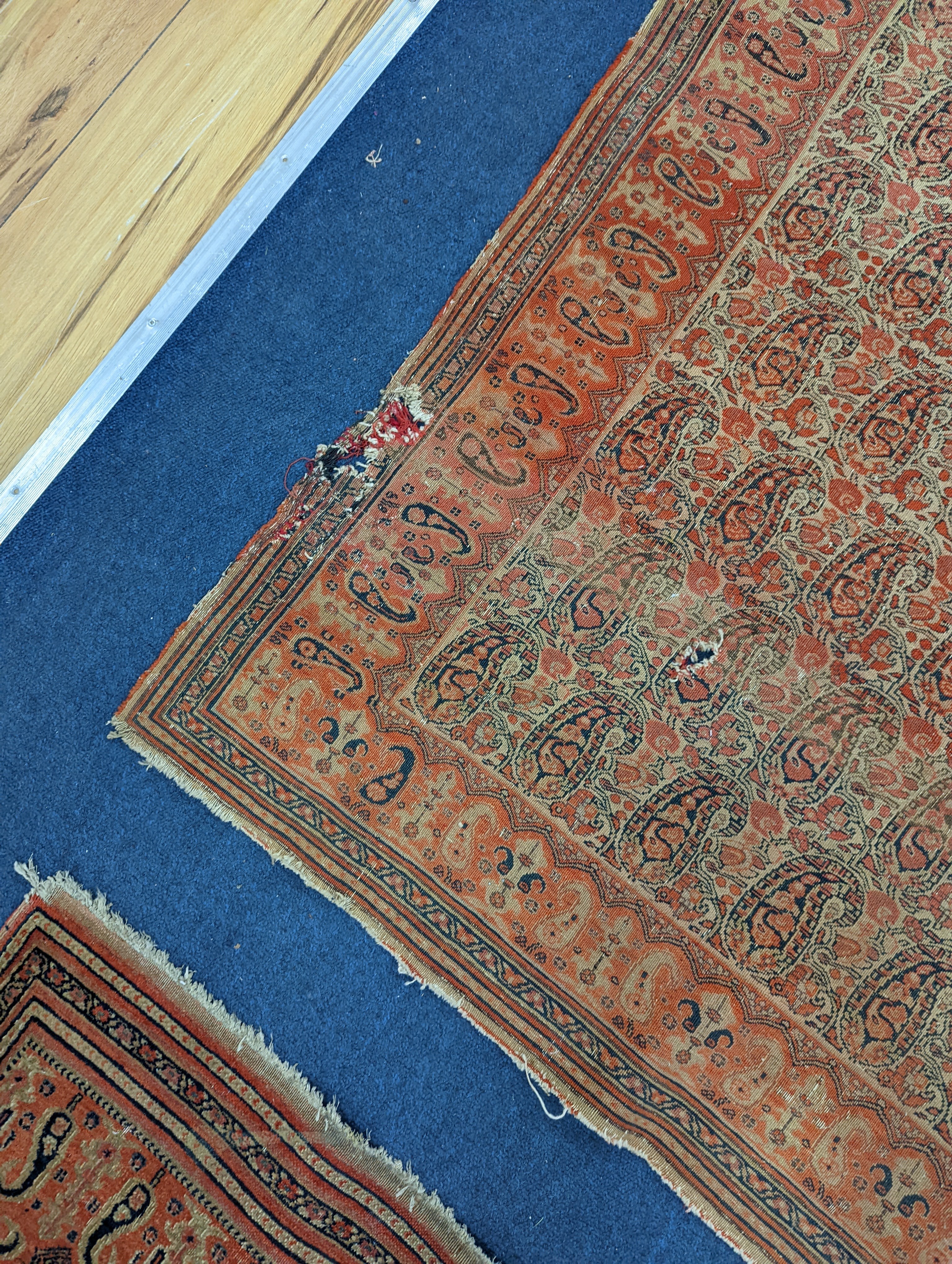 Three antique rugs, Caucasian and North West Persian, largest 230 x 154cm